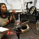 The hosts of the Little Black Dress podcast, Rocsi Diaz (left) and Nina Parker, interview actor Laz Alonso. (Columbia Journalism Review)
